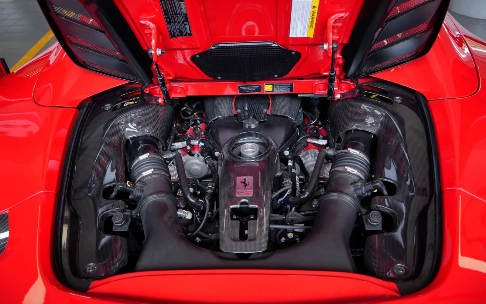 Close-up view of automotive engine components used for engine identification